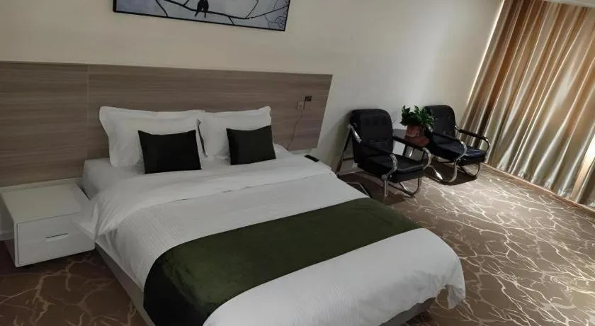 Bed in GreenTree Inn Yancheng Xiangshui Bus Station Express Hotel