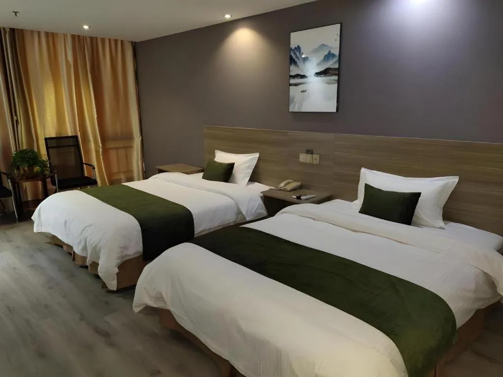 Bed in GreenTree Inn Yancheng Xiangshui Bus Station Express Hotel