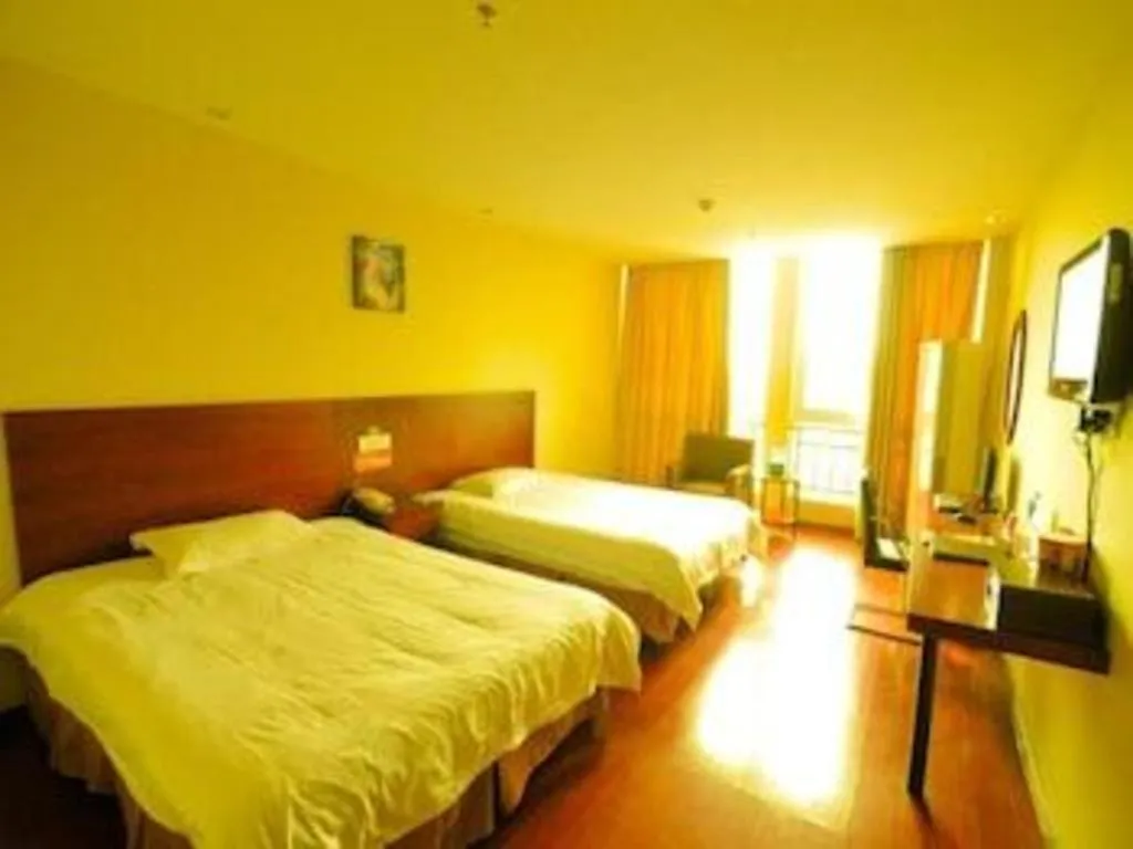 Bed in GreenTree Inn Yancheng Xiangshui Bus Station Express Hotel