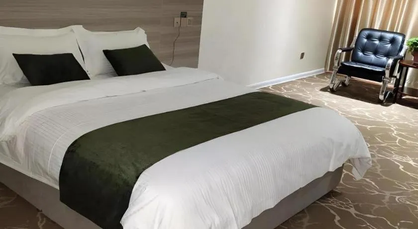 Bed in GreenTree Inn Yancheng Xiangshui Bus Station Express Hotel