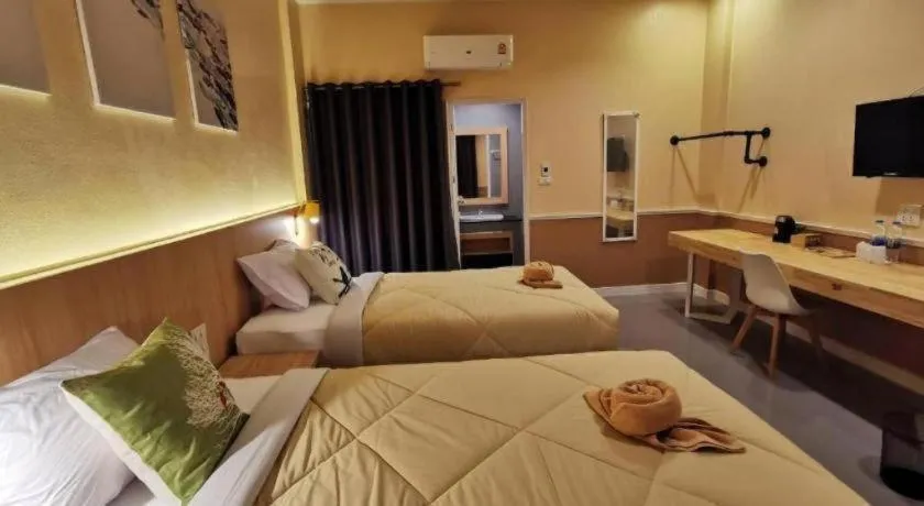 Bed in Kiatwimon Hotel