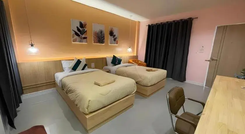 Bed in Kiatwimon Hotel Bed in Kiatwimon Hotel