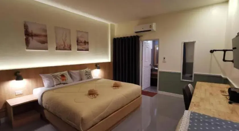 Bed in Kiatwimon Hotel Bed in Kiatwimon Hotel