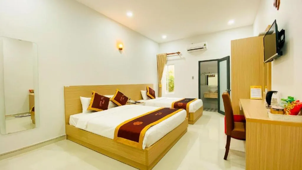 Bed in Hoang Mai Hotel