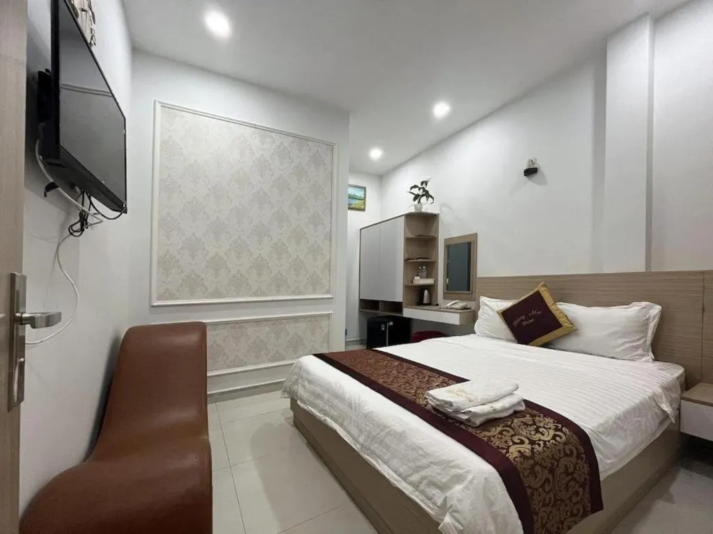 Bed in Hoang Mai Hotel