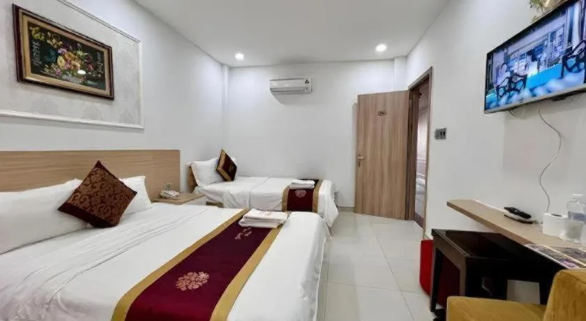 Bed in Hoang Mai Hotel