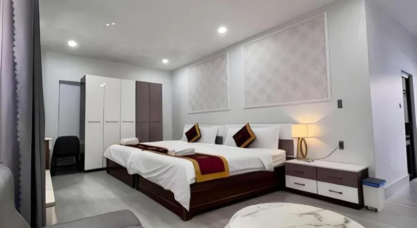 Bed in Hoang Mai Hotel