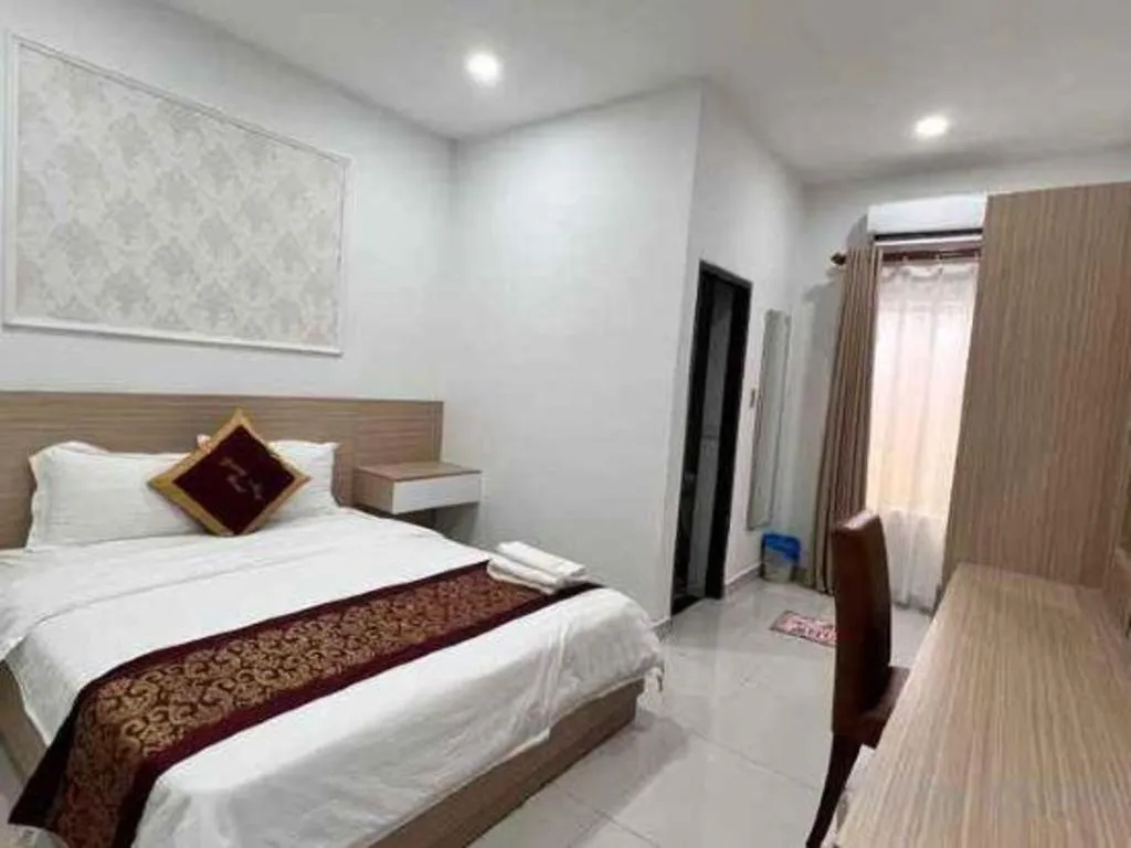 Bed in Hoang Mai Hotel