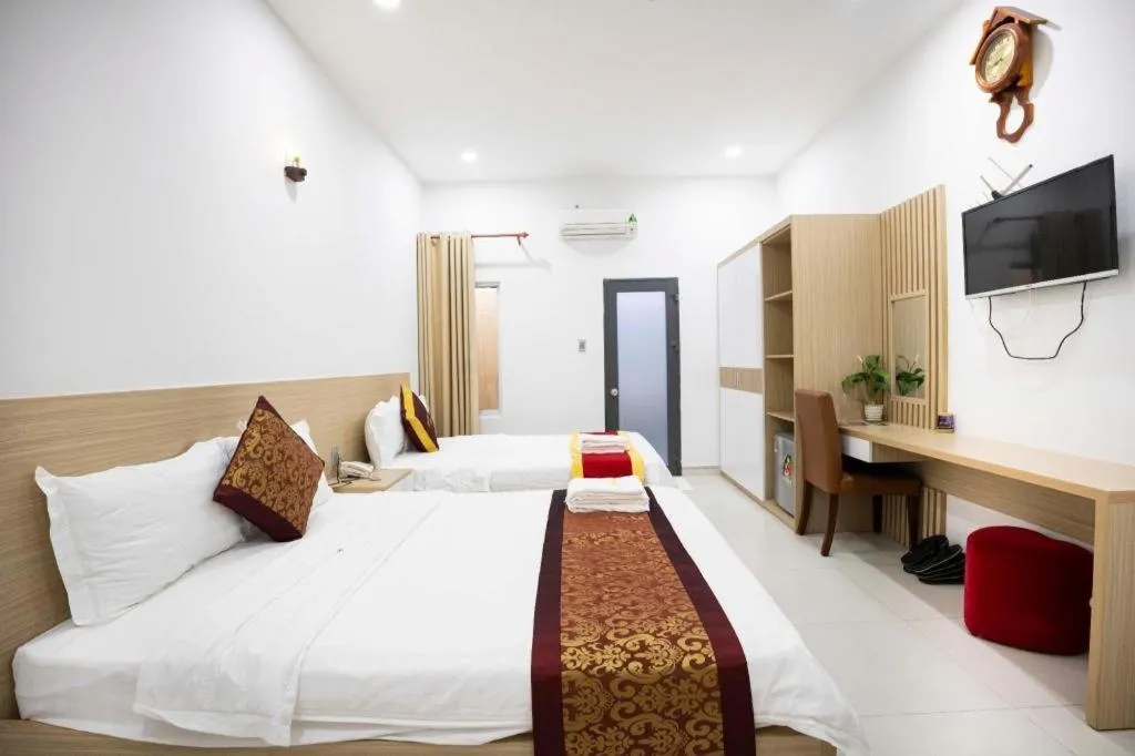 Bed in Hoang Mai Hotel