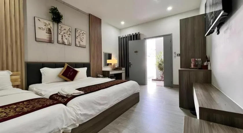 Bed in Hoang Mai Hotel