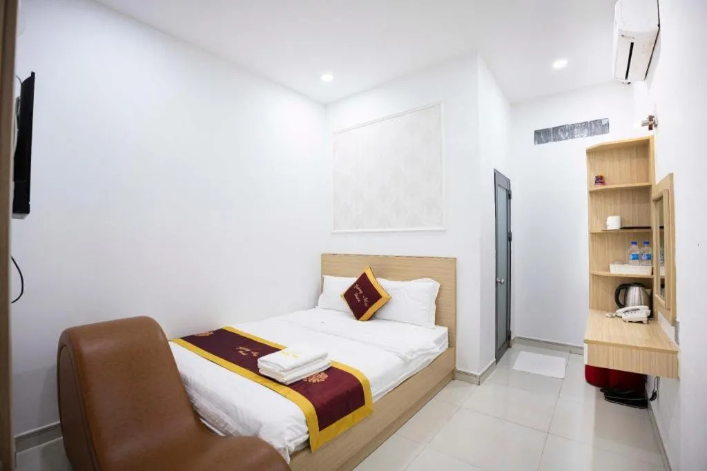 Bed in Hoang Mai Hotel