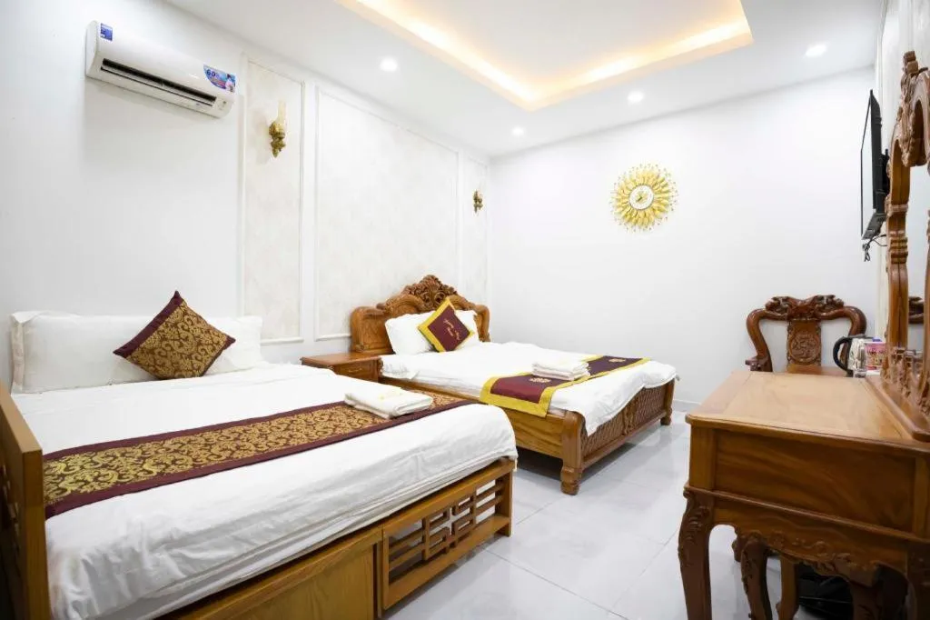 Bed in Hoang Mai Hotel