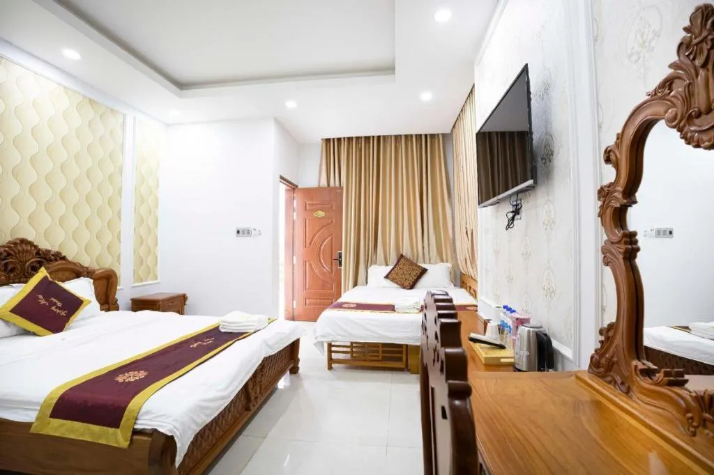 Bed in Hoang Mai Hotel