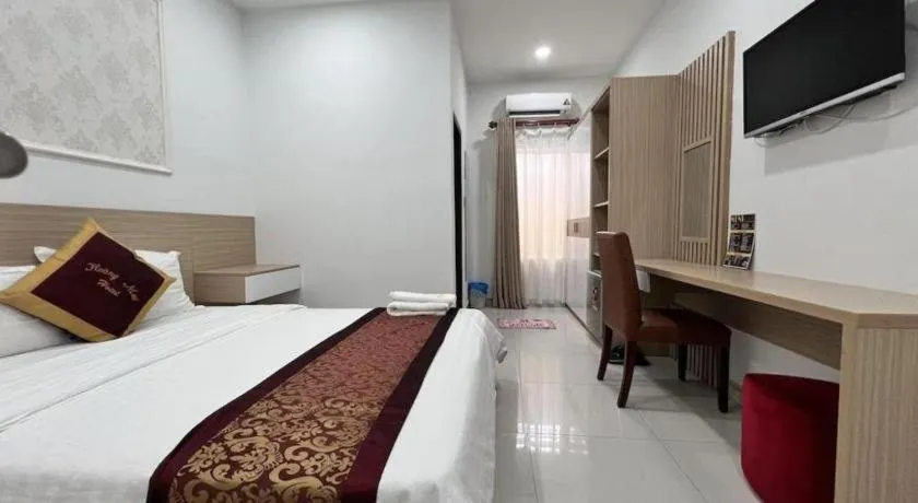 Bed in Hoang Mai Hotel