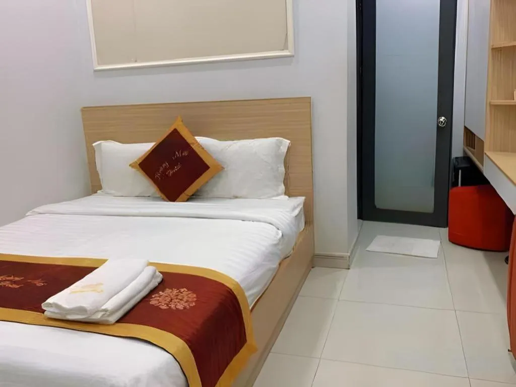 Bed in Hoang Mai Hotel