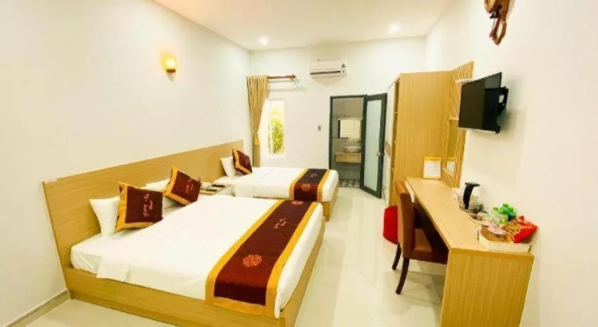 Bed in Hoang Mai Hotel