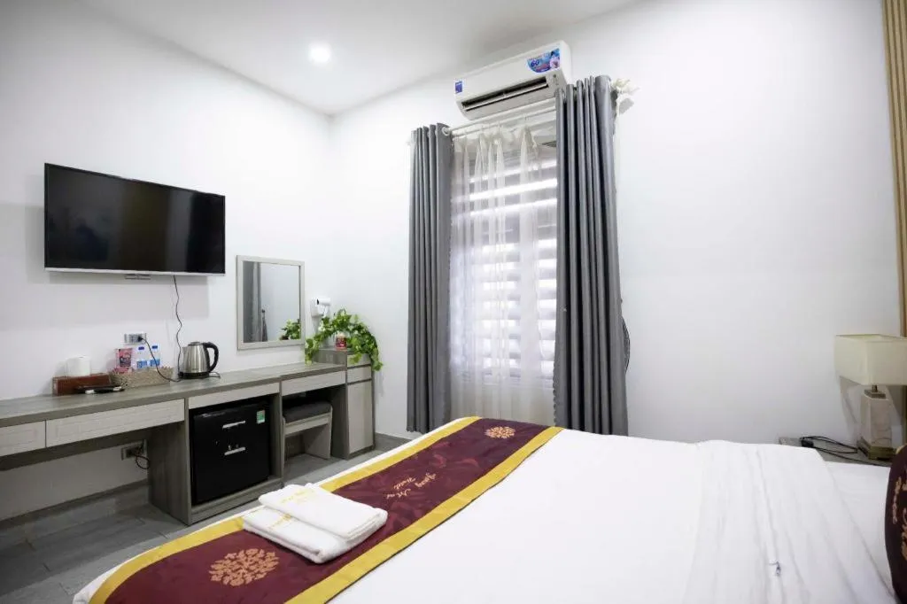 Bed in Hoang Mai Hotel