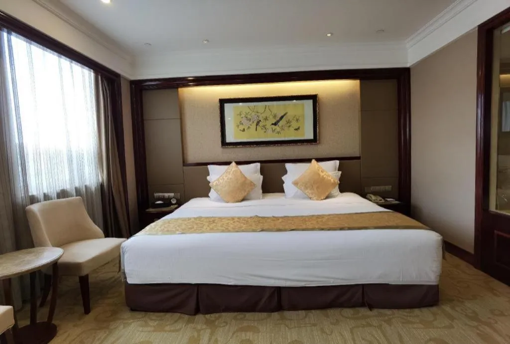 Bed in Chutian Guangdong International Hotel