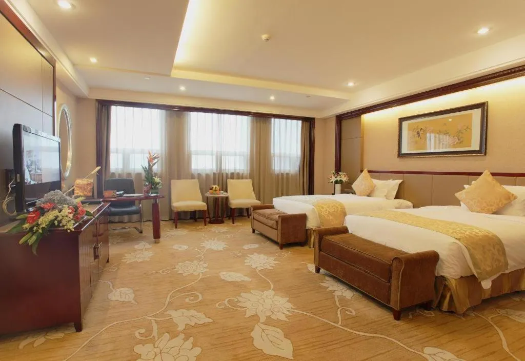 Bed in Chutian Guangdong International Hotel