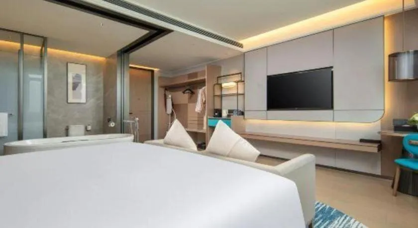 Bed in Chutian Guangdong International Hotel