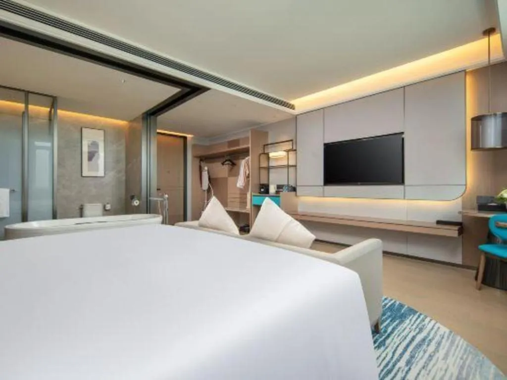 Bed in Chutian Guangdong International Hotel