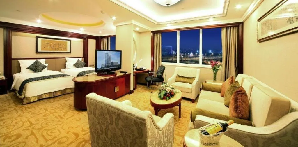 Bed in Chutian Guangdong International Hotel