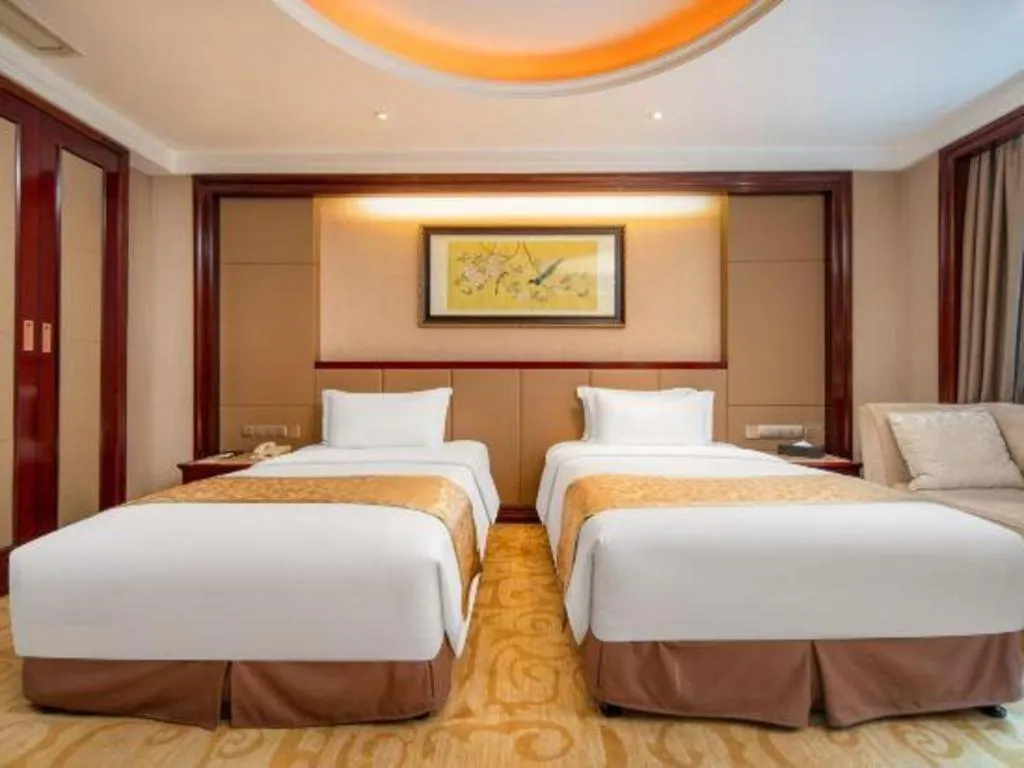 Bed in Chutian Guangdong International Hotel