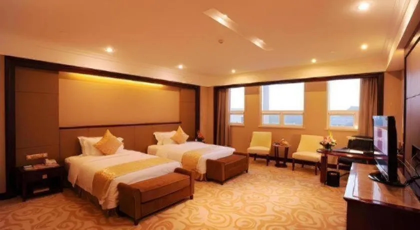 Bed in Chutian Guangdong International Hotel