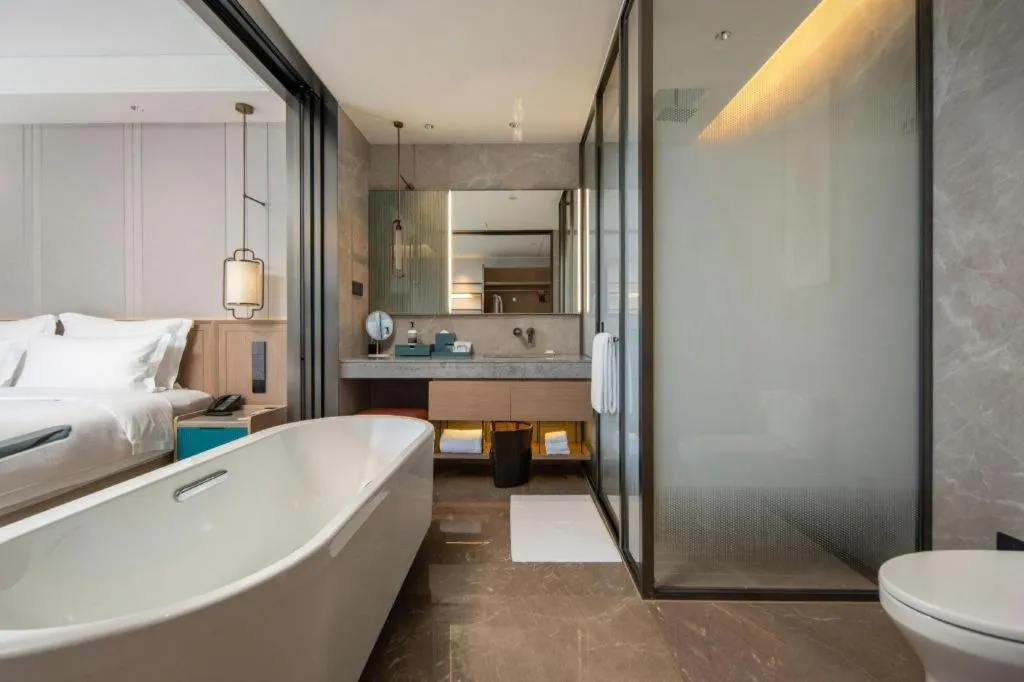 Bed in Chutian Guangdong International Hotel