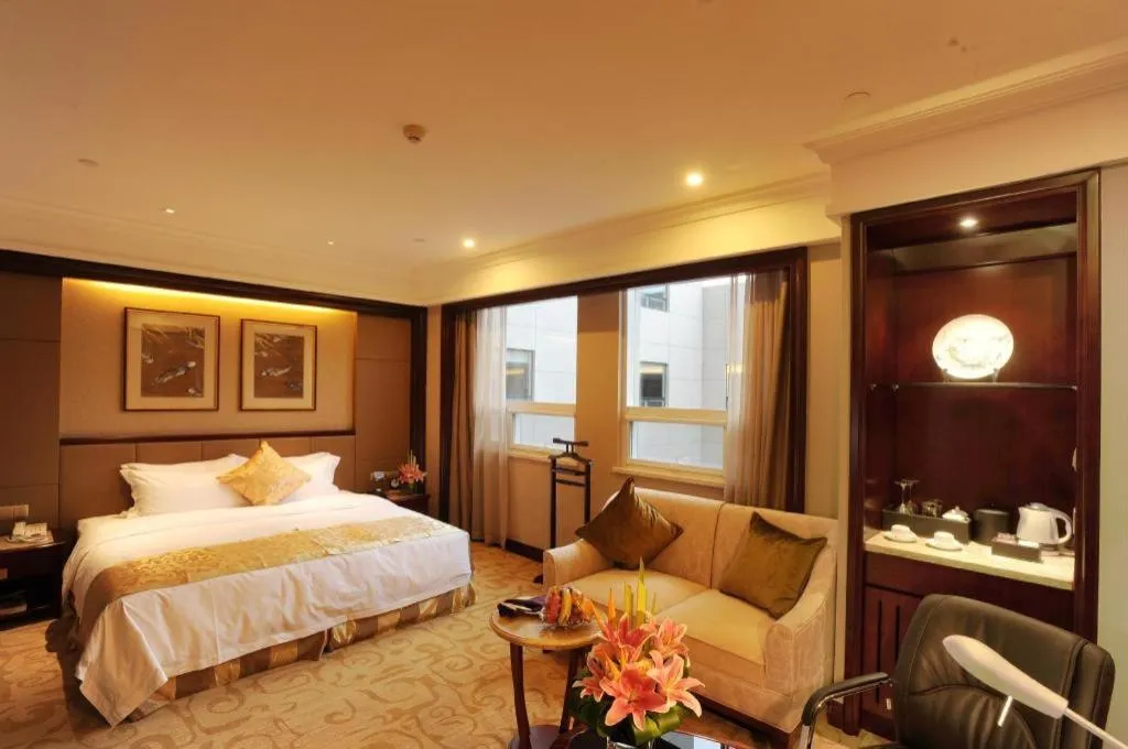 Bed in Chutian Guangdong International Hotel