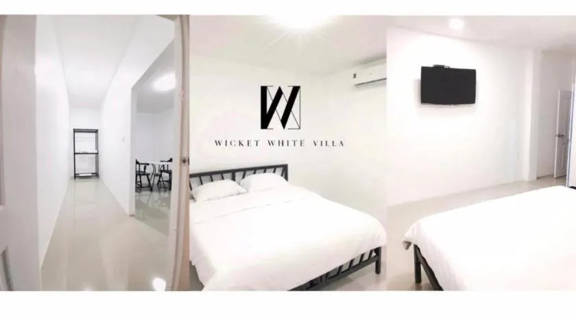 Bed in WICKET WHITE VILLA