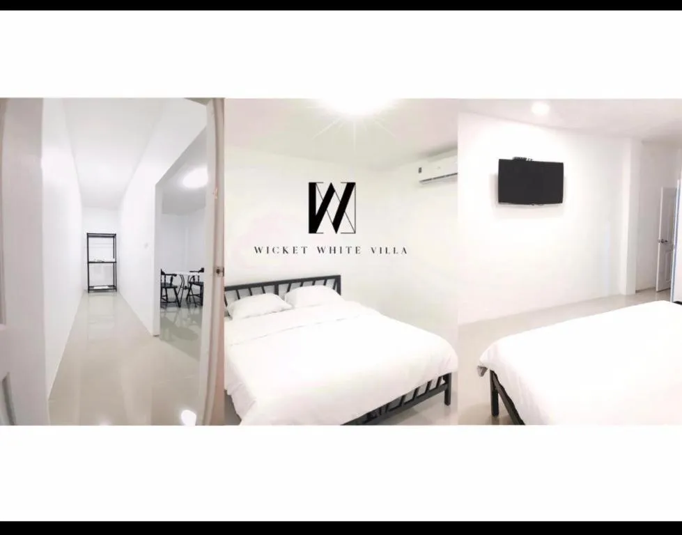 Bed in WICKET WHITE VILLA