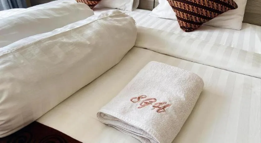 Bed in Sumbawa Grand Hotel