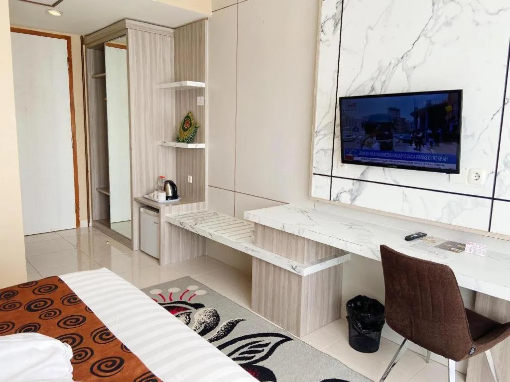 Bed in Sumbawa Grand Hotel