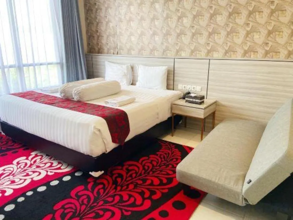 Bed in Sumbawa Grand Hotel