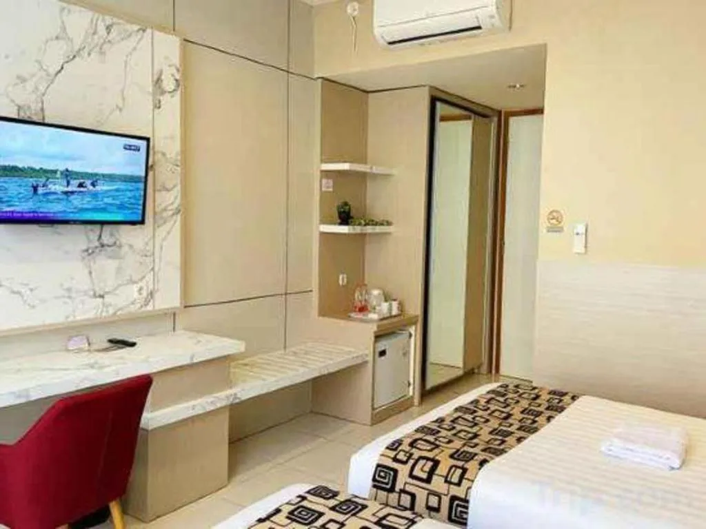 Bed in Sumbawa Grand Hotel