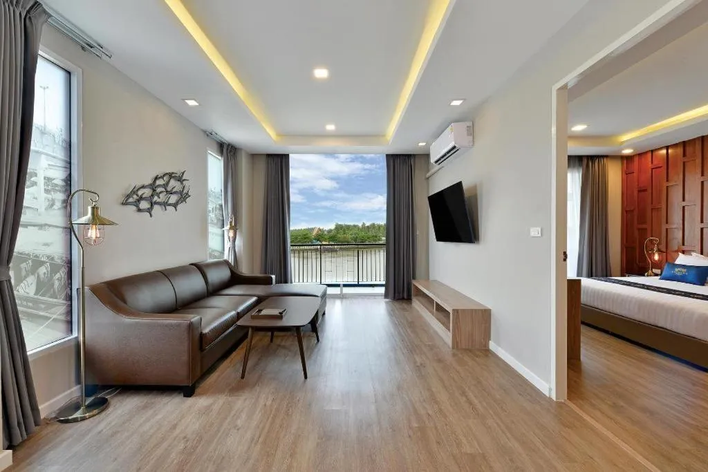 Bed in Amphawa Riverfront Hotel