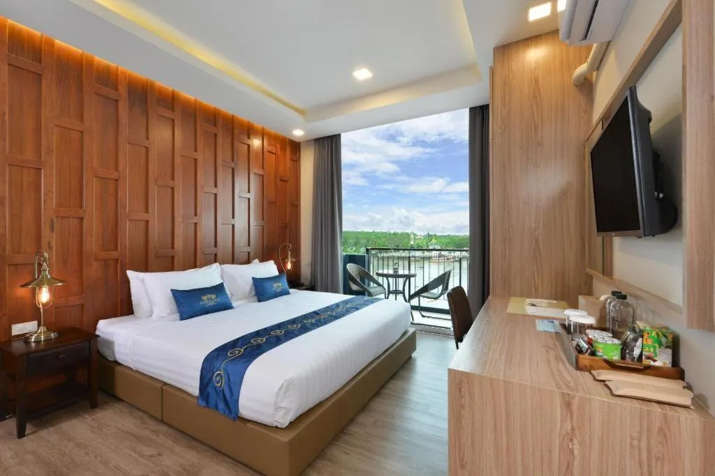 Bed in Amphawa Riverfront Hotel