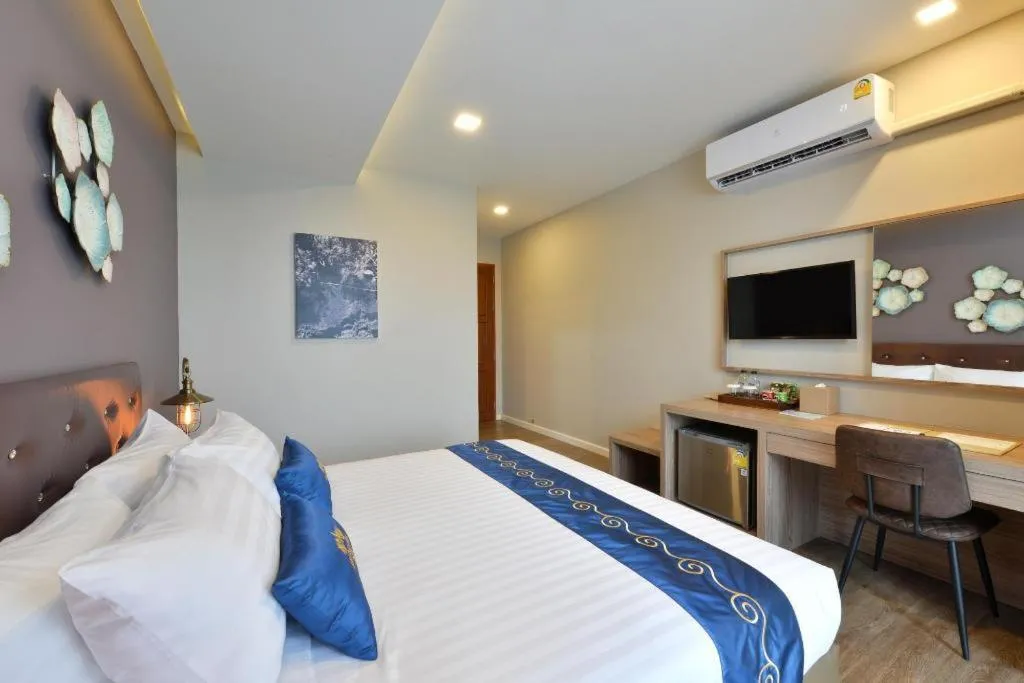 Bed in Amphawa Riverfront Hotel