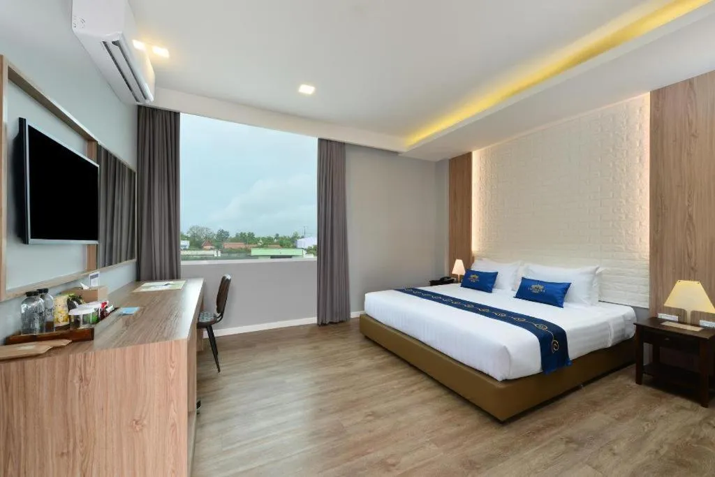 Bed in Amphawa Riverfront Hotel