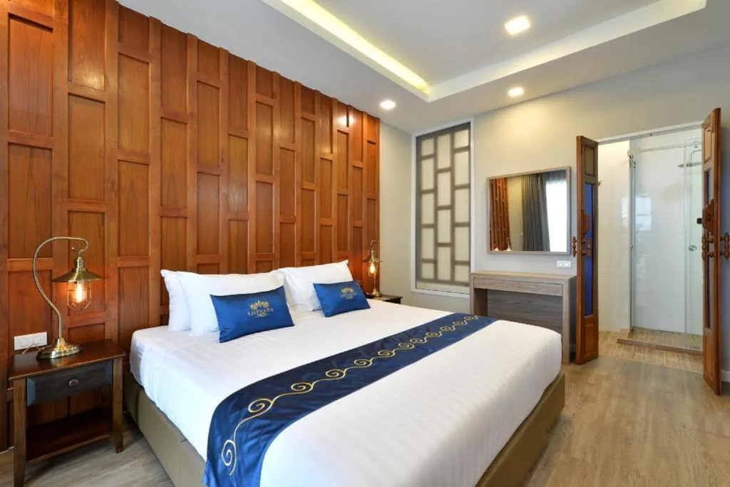 Bed in Amphawa Riverfront Hotel