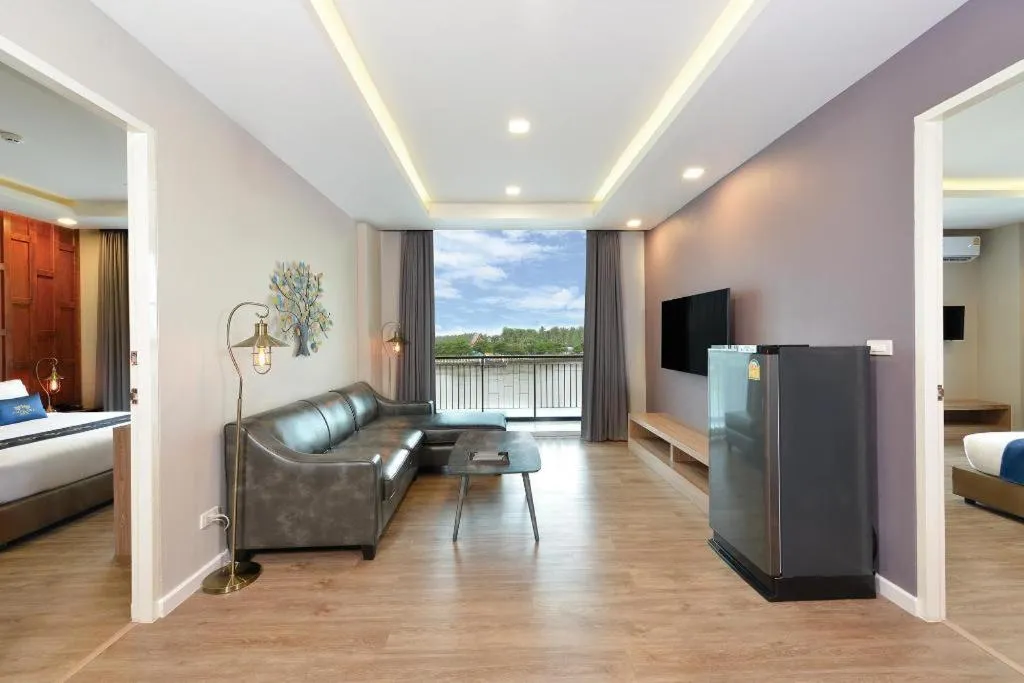 Bed in Amphawa Riverfront Hotel