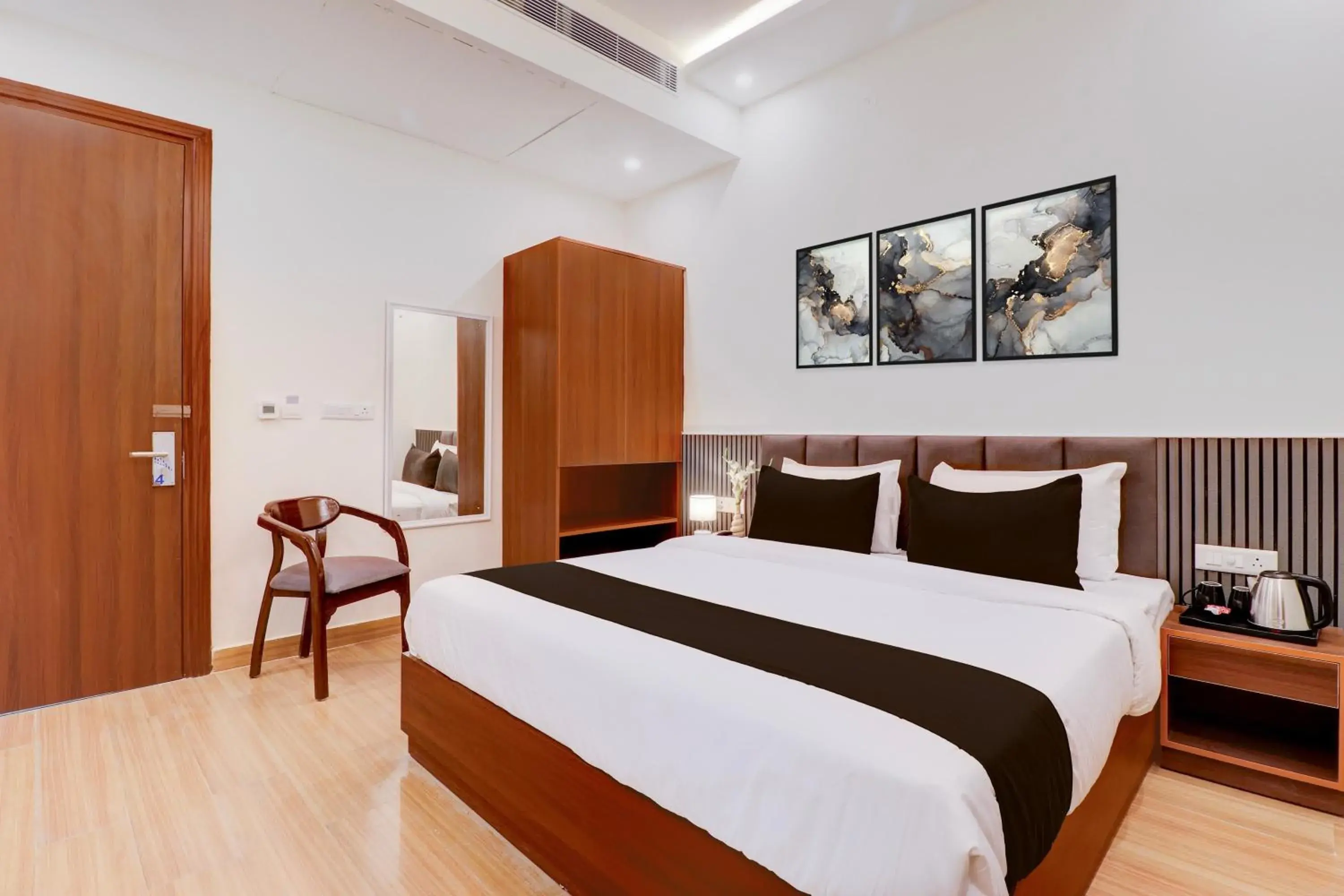 Classic Triple Room - single occupancy in Super Townhouse Oak FRI Dehradun Formerly Hotel EL Portrait Classic Triple Room - single occupancy in Super Townhouse Oak FRI Dehradun Formerly Hotel EL Portrait