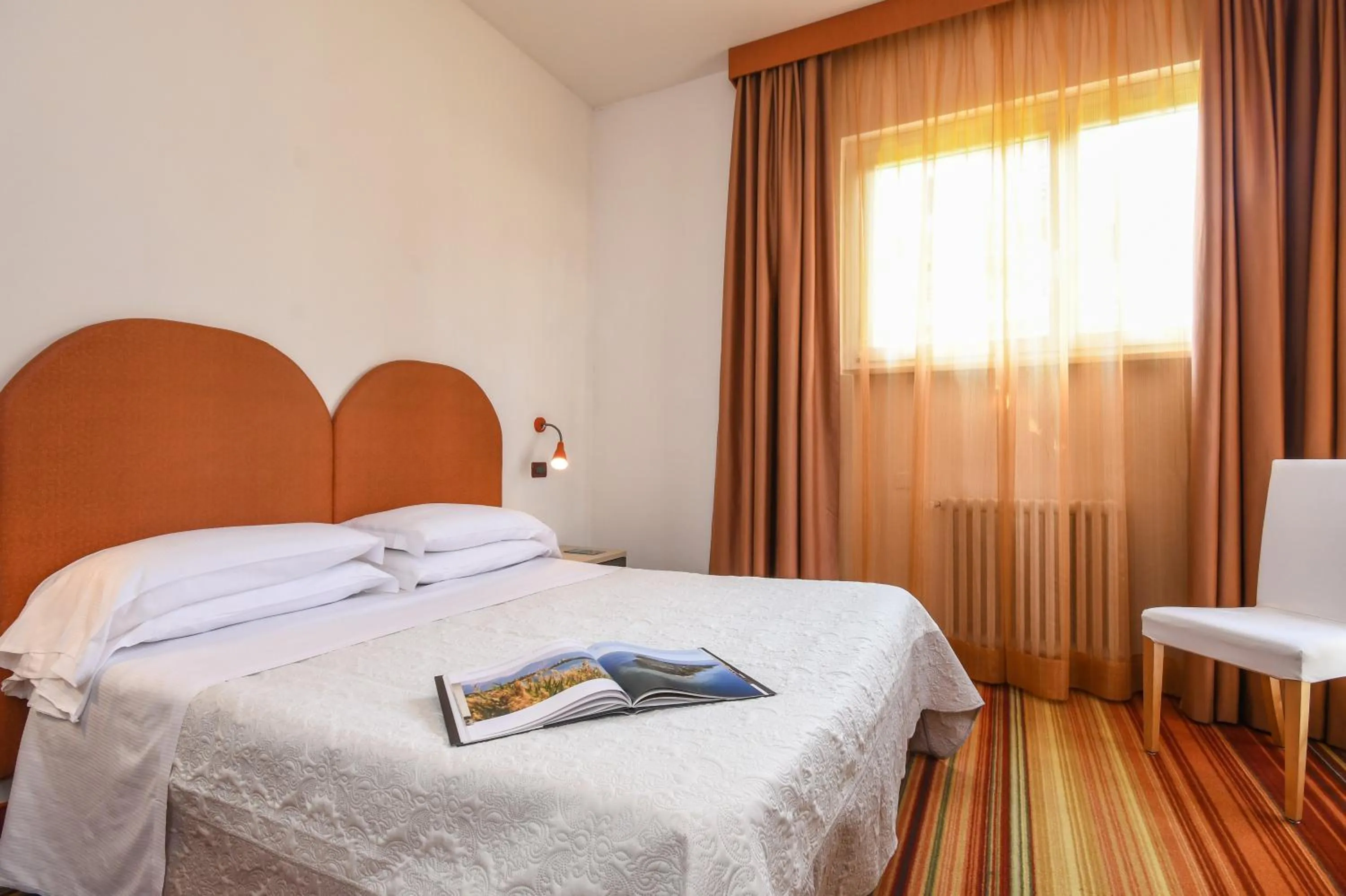 Bedroom in Hotel Suisse