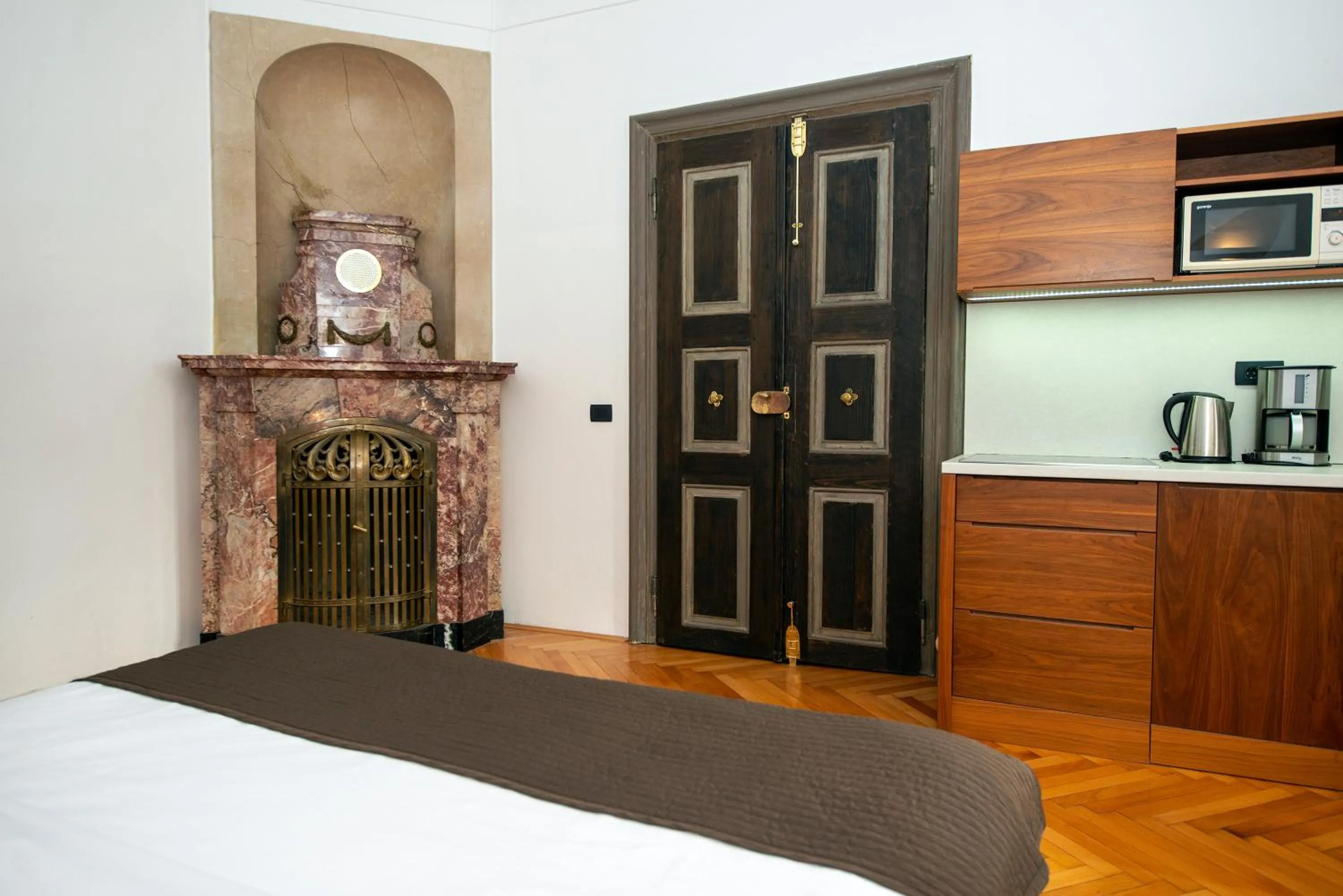 Bed in Zois Apartments