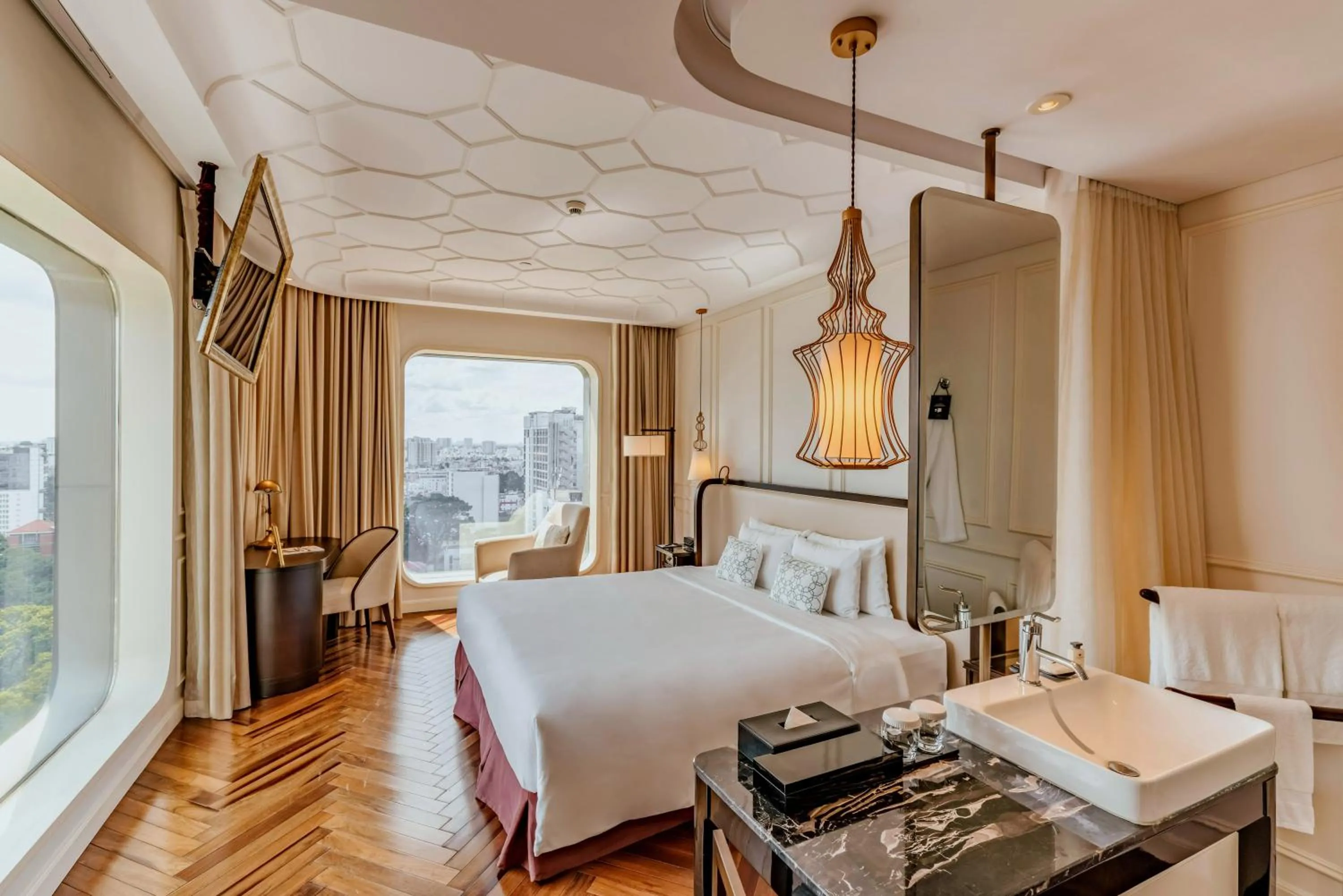 Bed in Hotel Des Arts Saigon Mgallery Collection