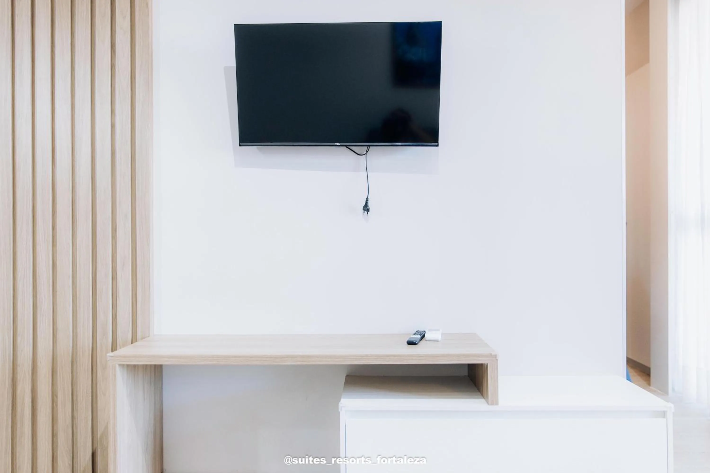 TV and multimedia in Apartamento - Pé na areia - Ao lado do parque aquático - Administrado por Anfitrião