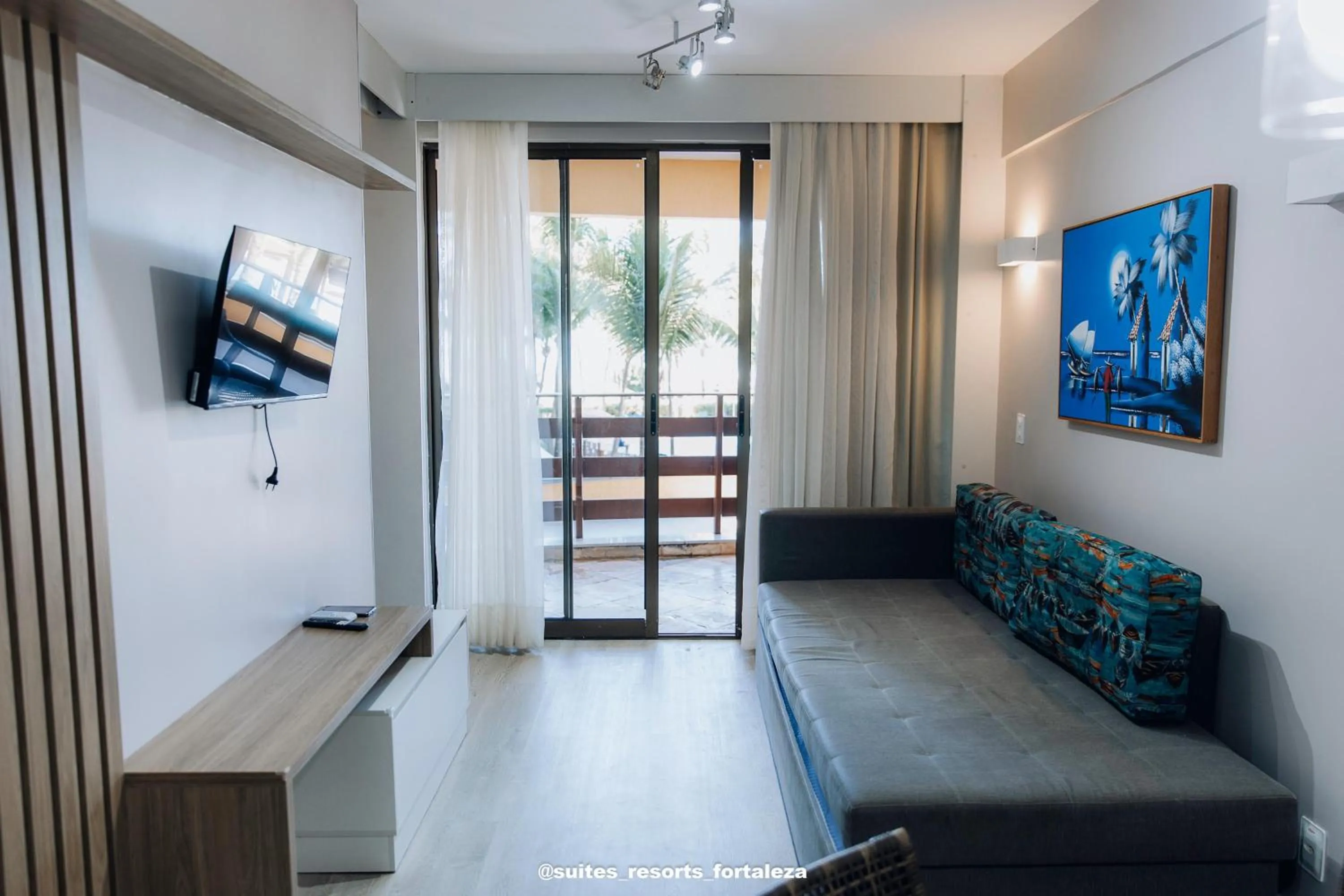 Living room in Apartamento - Pé na areia - Ao lado do parque aquático - Administrado por Anfitrião