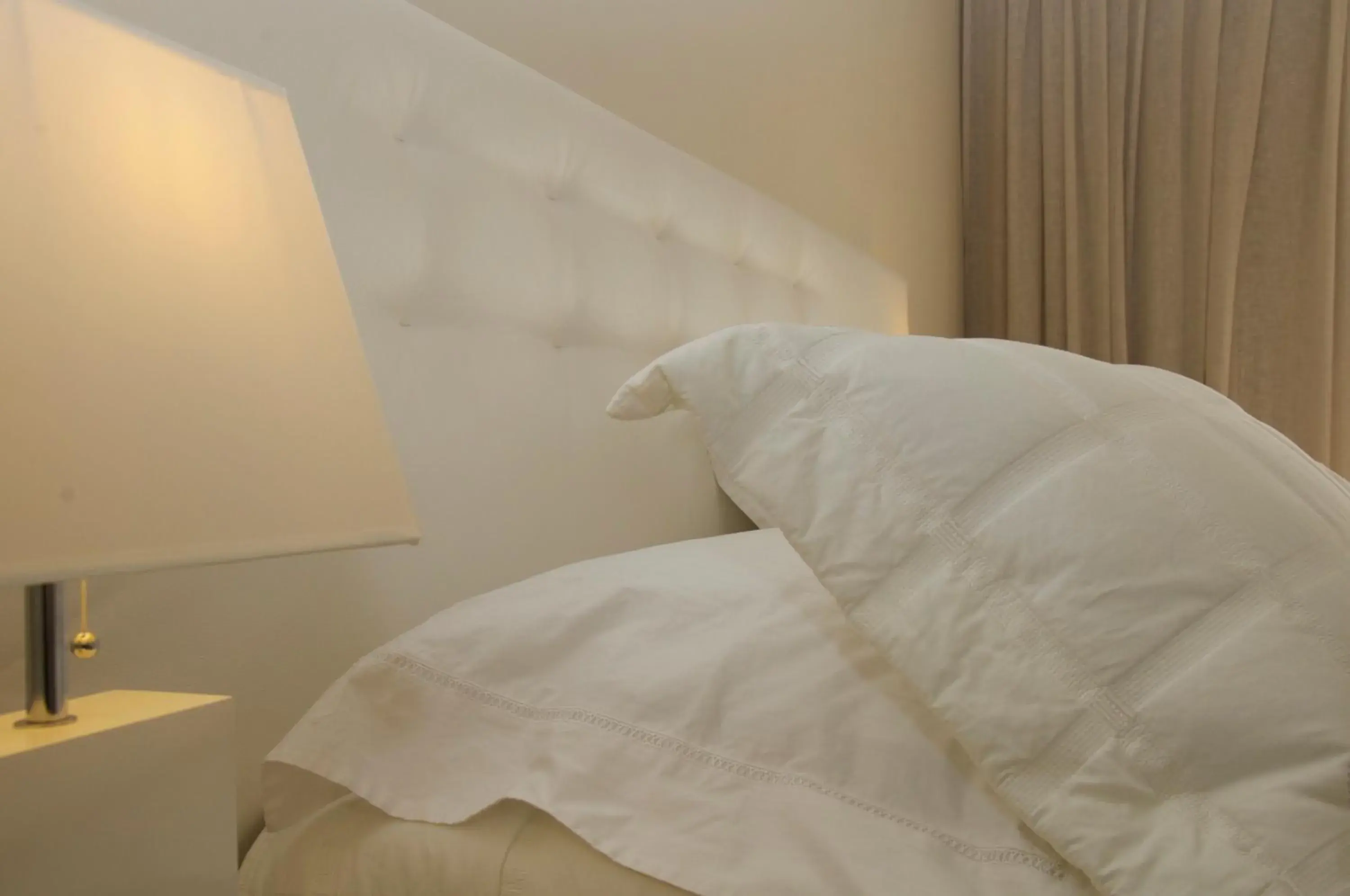 Bed in Ino Hotel & Suites Bed in Ino Hotel & Suites