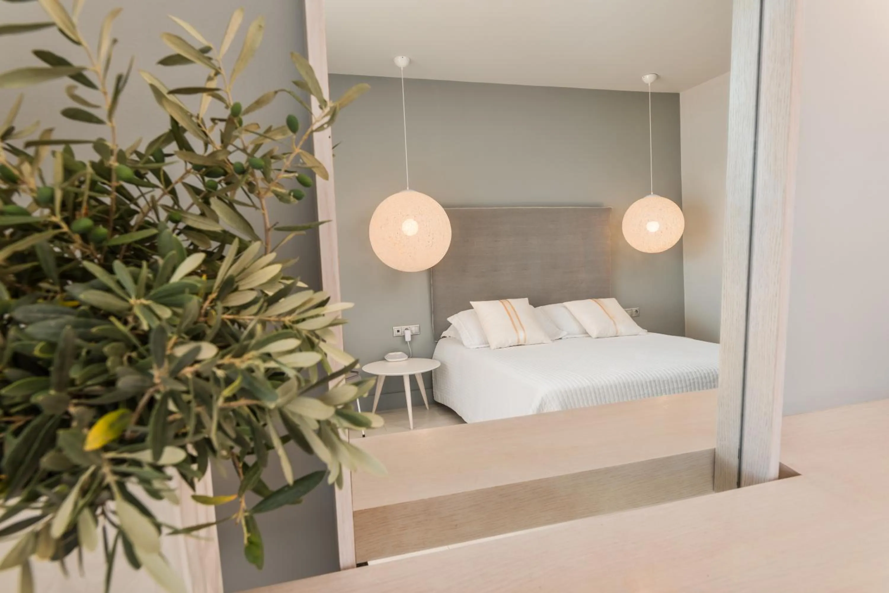 Bed in Ino Hotel & Suites